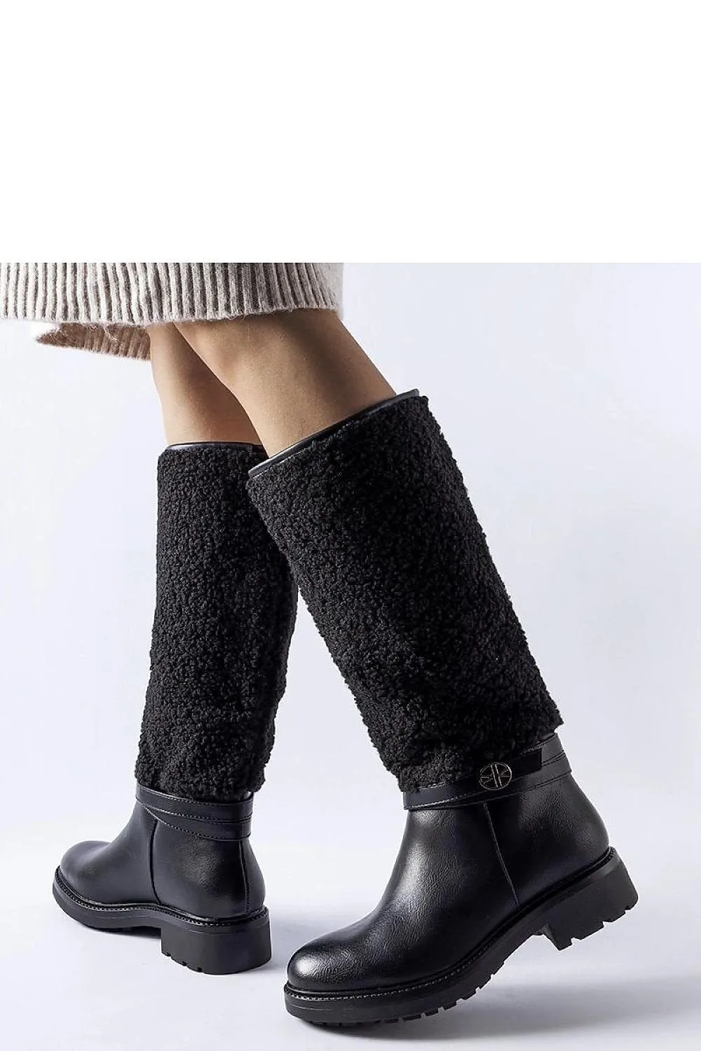 Black boots decorated with fur